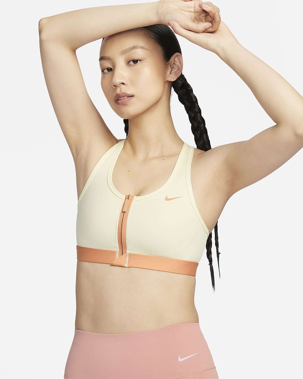Nike Swoosh 女子中强度支撑速干衬垫前拉链运动内衣