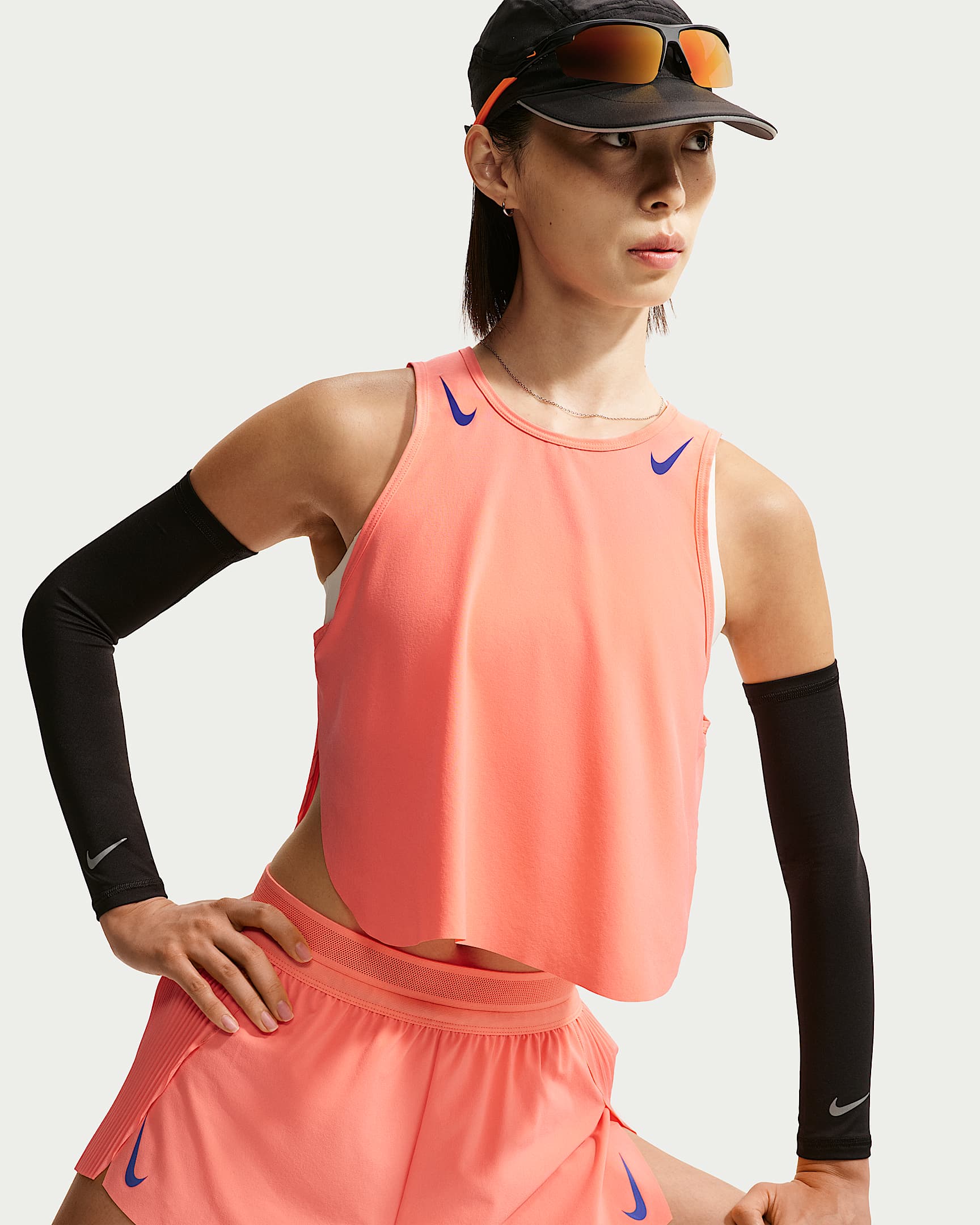 Nike AeroSwift Dri-FIT ADV 耐克女子夜跑系列女子速干短款跑步背心 - 原子粉/旧宝蓝