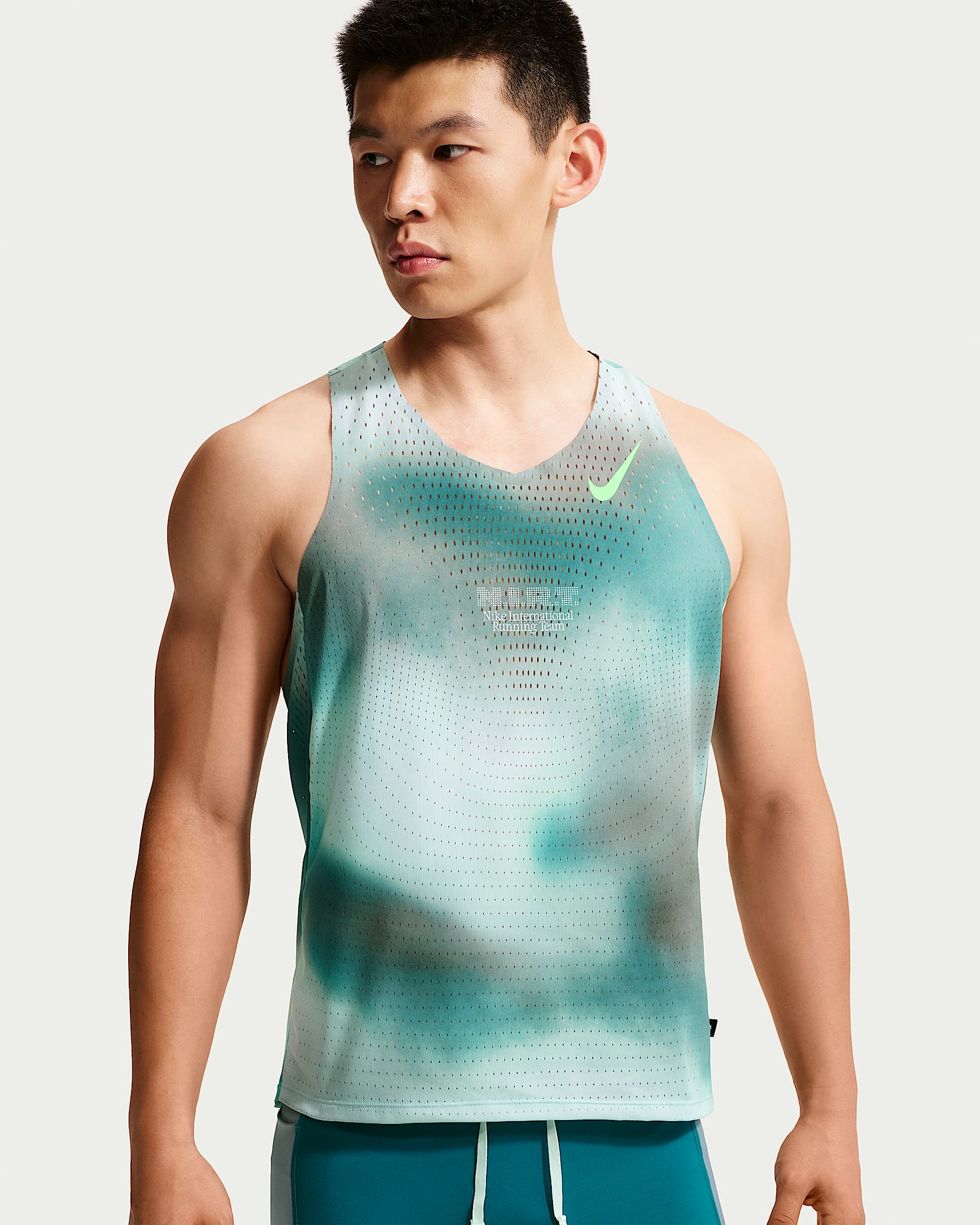 Nike AeroSwift Dri-FIT ADV 男子速干跑步背心 - 亮杉木绿