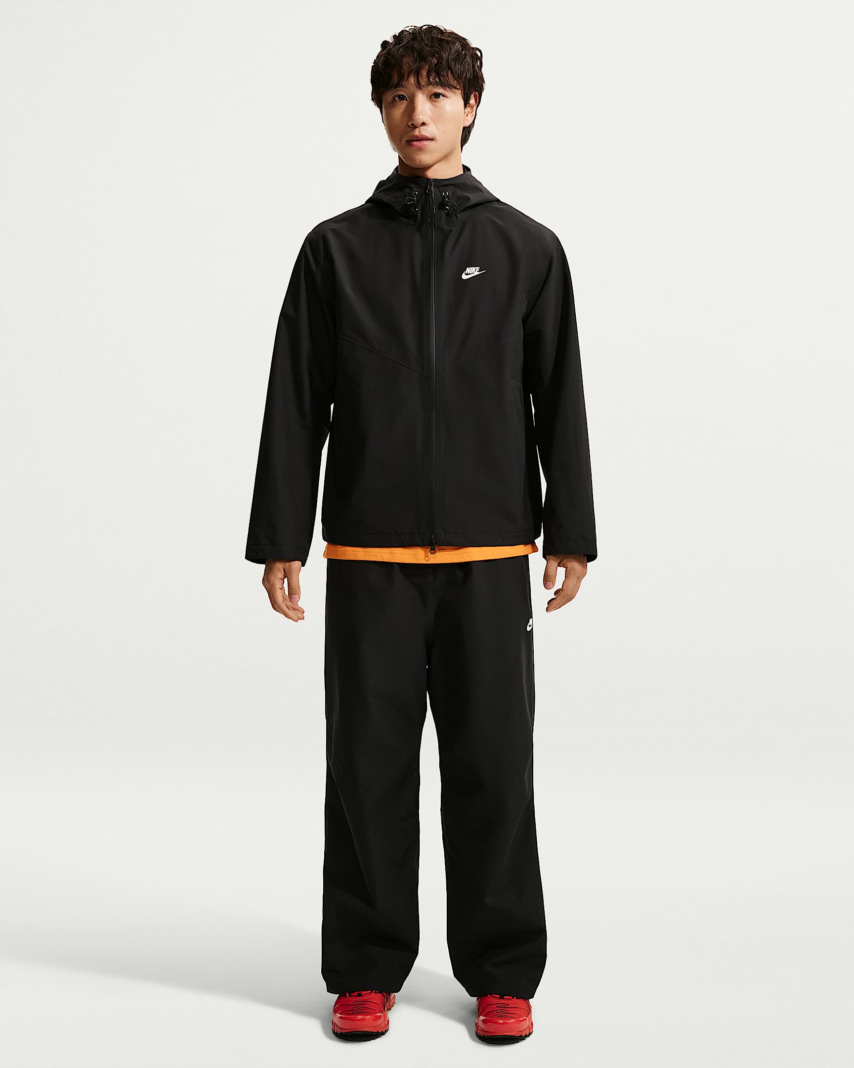 Nike Windrunner Storm-FIT ADV 男子防风防水长裤 - 黑/白色