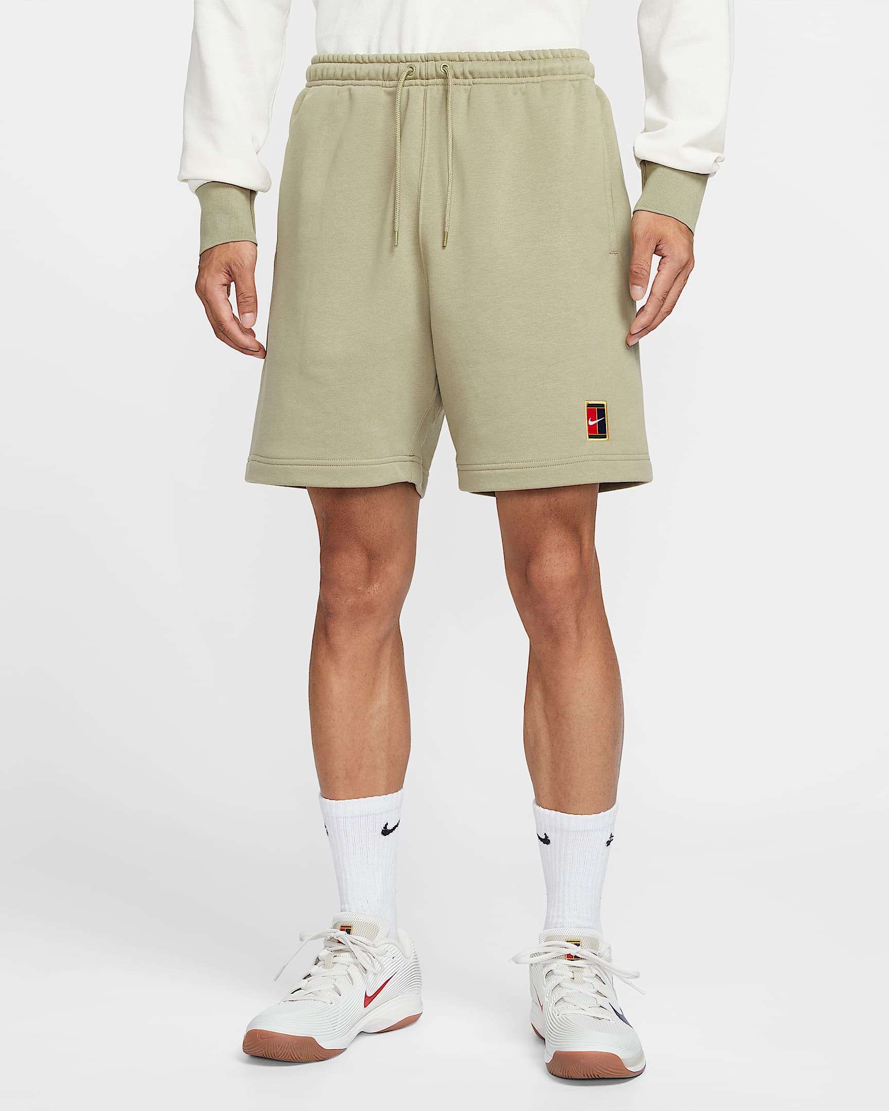 NikeCourt Heritage Dri-FIT 男子速干针织网球短裤 - 橄榄绿