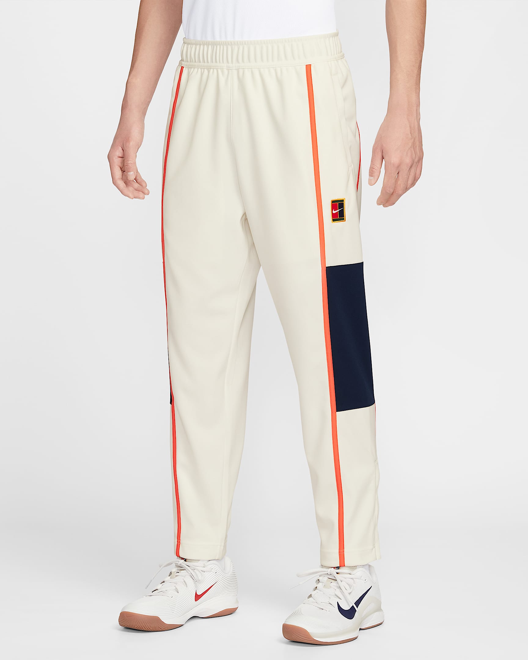 NikeCourt Heritage 男子薄绒网球长裤 - 帆白/草皮橙