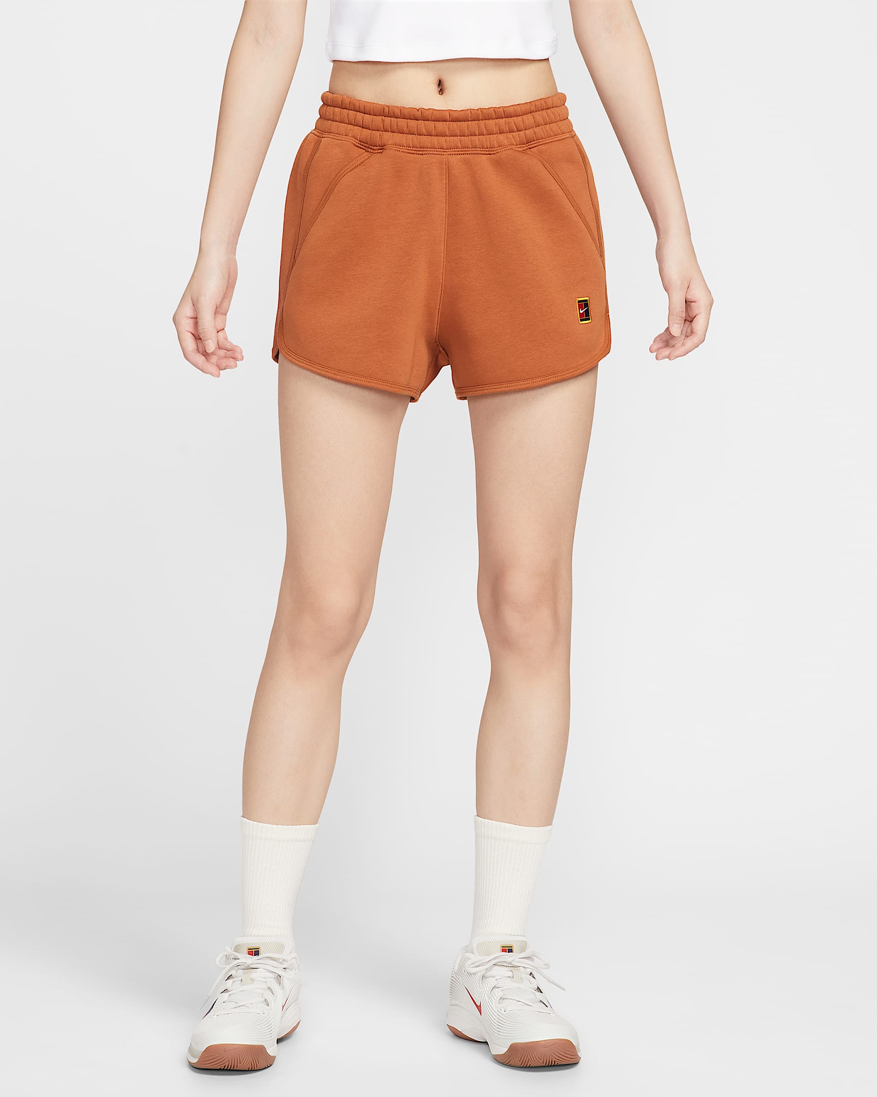 NikeCourt Heritage 女子加绒网球短裤 - 暗赤褐