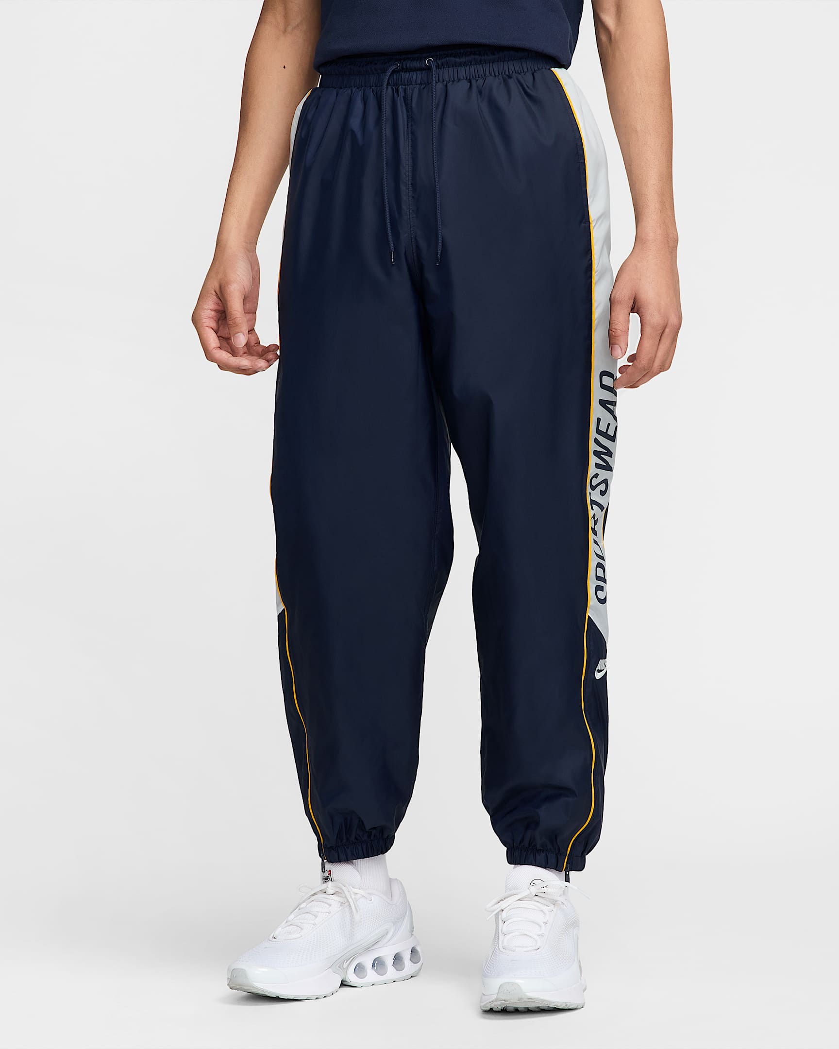 Nike Club 男子梭织长裤 - 黑曜石色/尘光子色/大学金/尘光子色