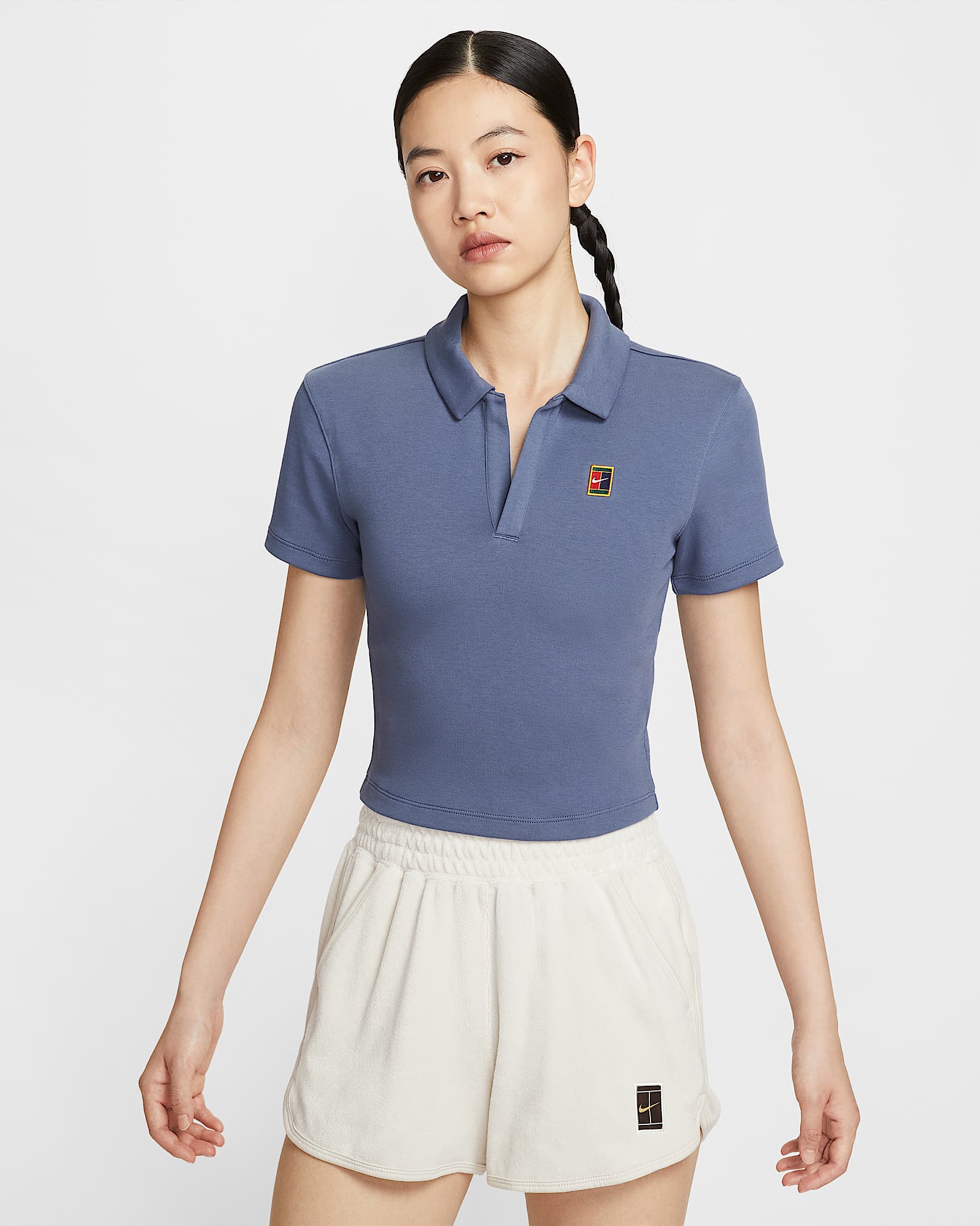 NikeCourt Heritage 女子短袖短款网球翻领T恤 - 芬蓝