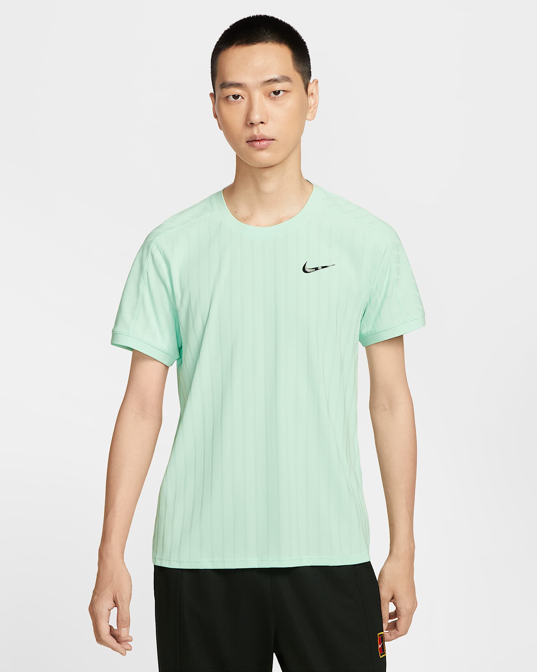 NikeCourt Slam Dri-FIT ADV 男子速干网球上衣 - 泡沫薄荷绿
