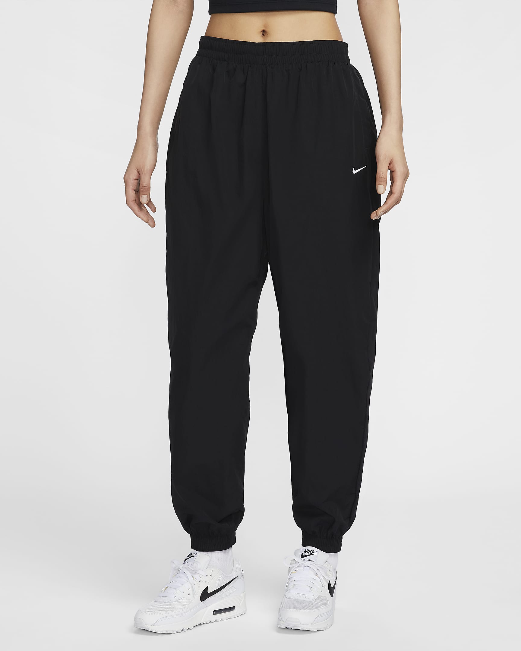 Nike Sportswear Essential 女子防晒中腰 Oversize 风梭织长裤 - 黑/白色
