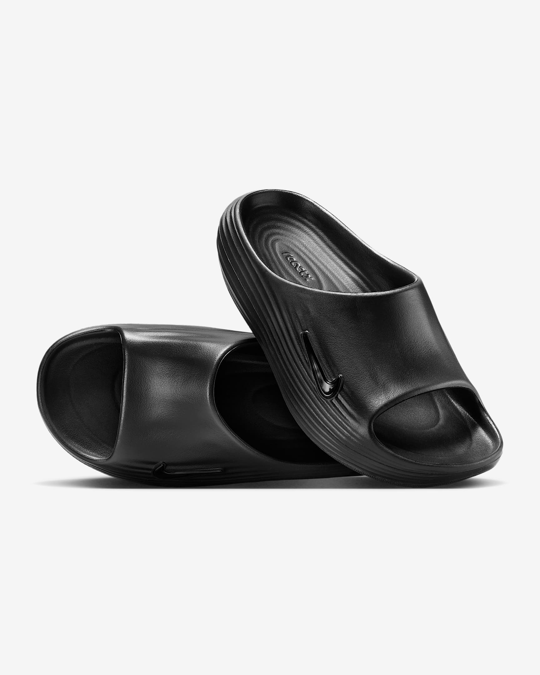 Nike ReactX Rejuven8 女子一脚蹬拖鞋 - 黑/黑/黑