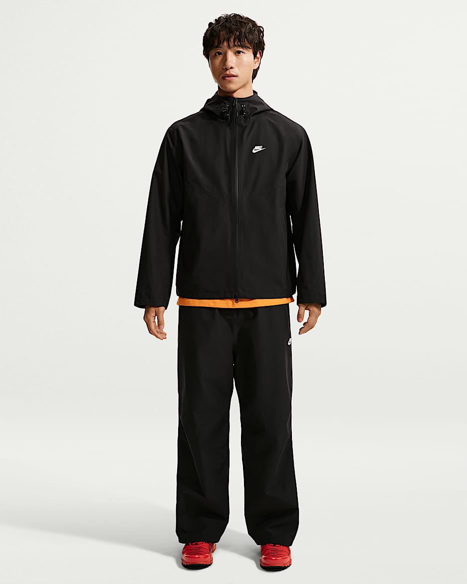 Nike Windrunner Storm-FIT ADV 男子防风防水长裤 - 黑/白色