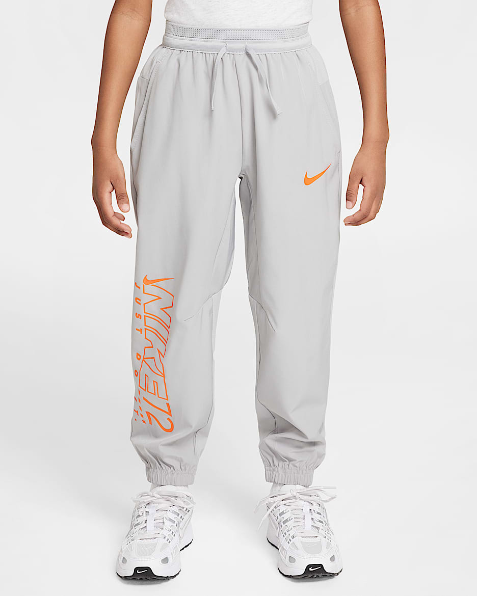 Nike Rhythm Dri-FIT 幼童速干梭织长裤 - 浅烟灰