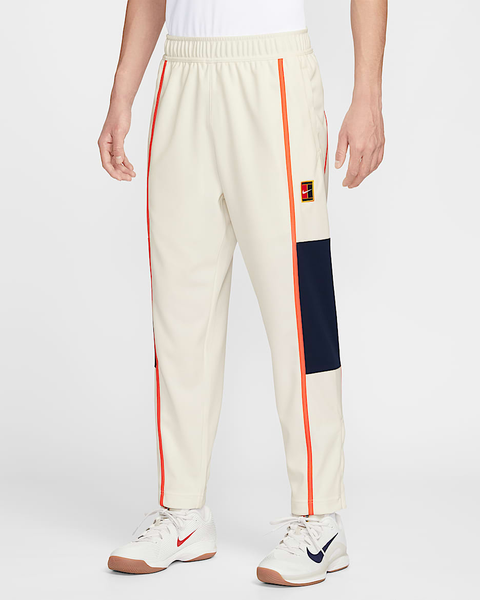 NikeCourt Heritage 男子薄绒网球长裤 - 帆白/草皮橙