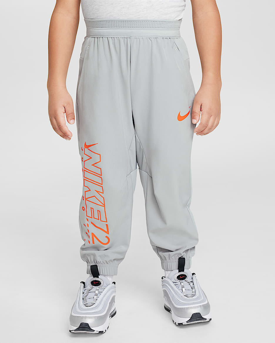 Nike Rhythm Dri-FIT 婴童速干梭织长裤 - 浅烟灰