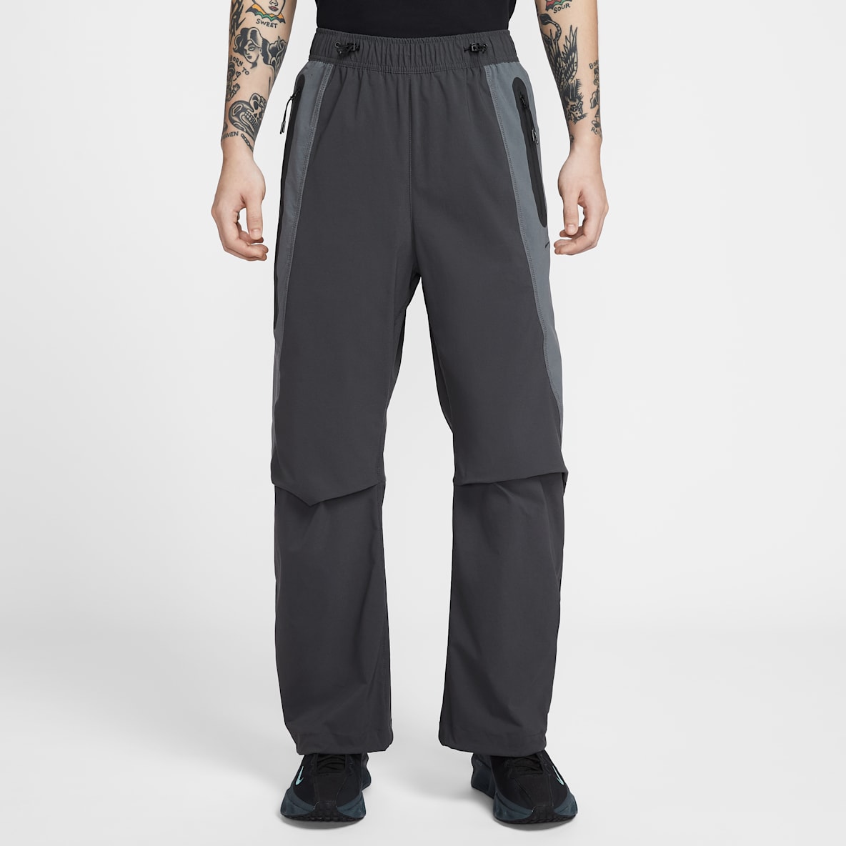 Nike Tech Dri-FIT 男子速干梭织撞色长裤