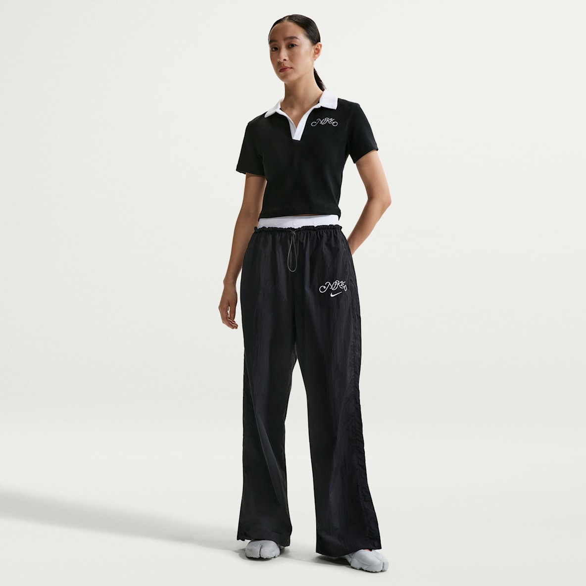 Nike Sportswear 女子高腰降落伞长裤